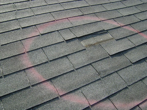 Call a local poway roofer for storm damage repair
