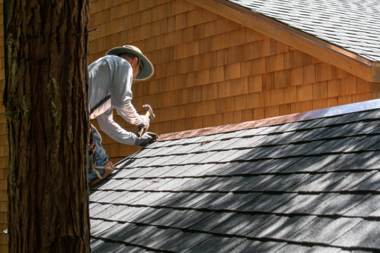 Professional roof repairs being carried out on a Poway home by Sequoia Roofing.