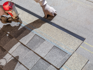 Installing wind-resistant materials on a San Diego rooftop.