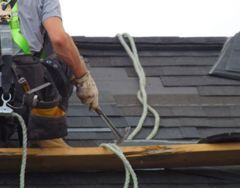 San Diego roof repair in progress with missing shingles